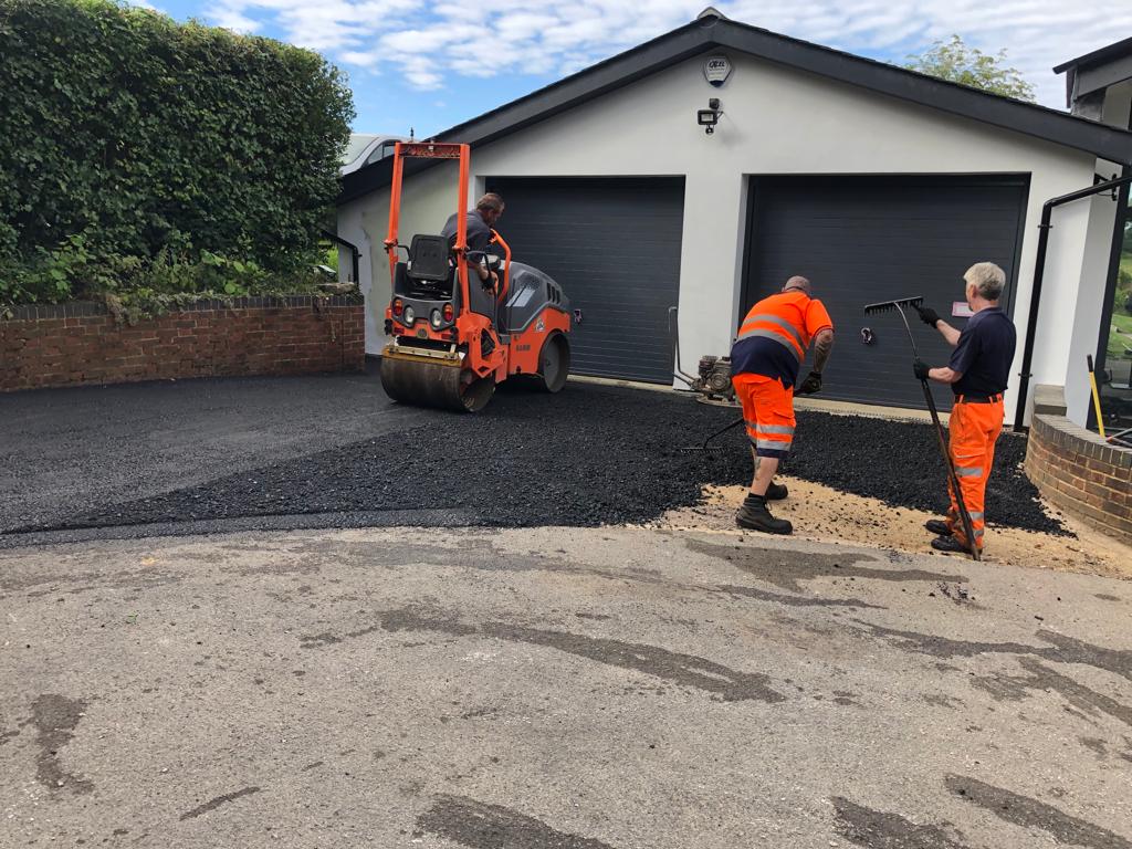 This is a photo of a bitumen driveway which is in the process of being installed by Cessnock Road Tek