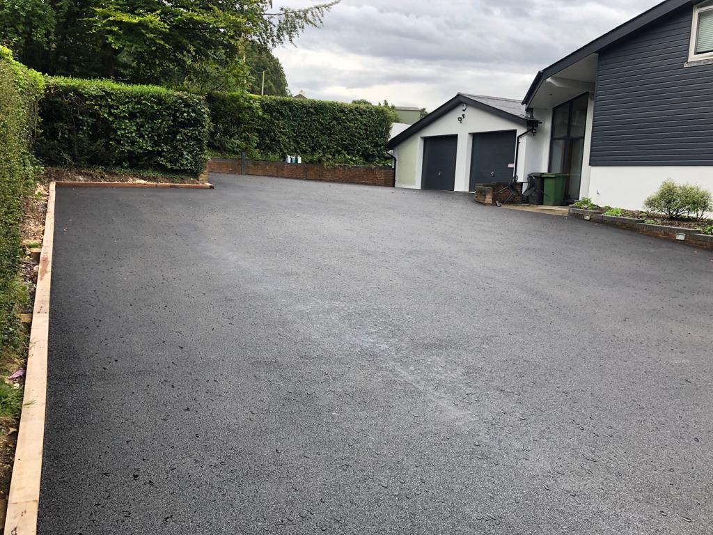This is a photo of a asphalt driveway which is in the process of being installed by Cessnock Road Tek